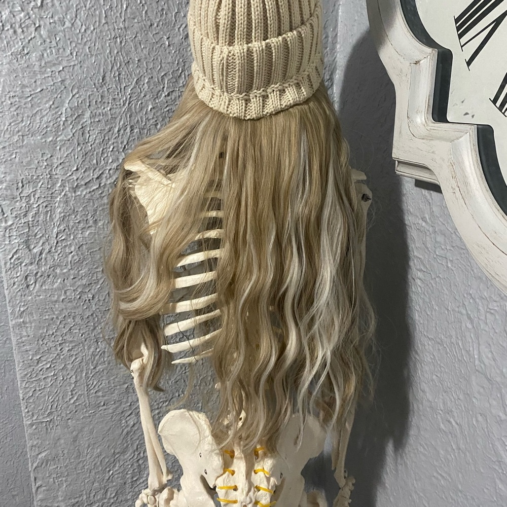 Hair extensions with a hat. I have never worn.